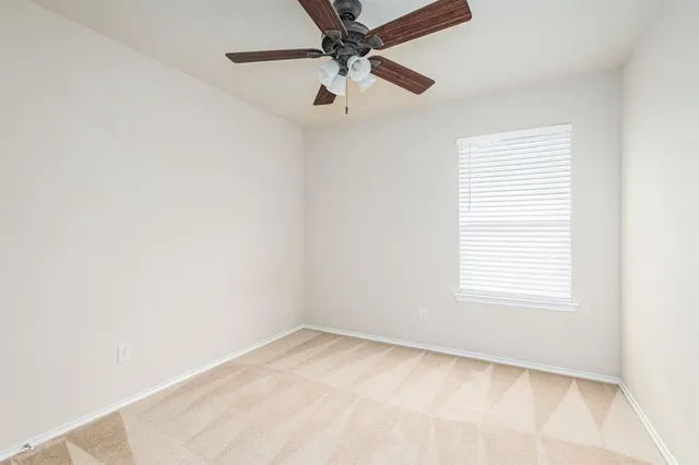 a view of a room that has a window in it