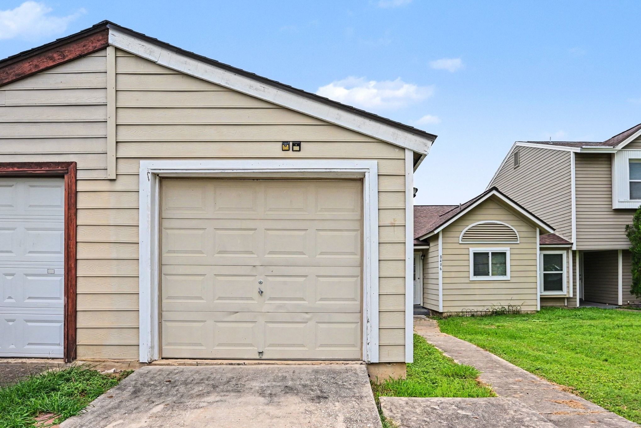 8406 Forest Ridge Drive San Antonio, TX 78239 - Photo 25 of 33 a view of a house with a small yard and plants