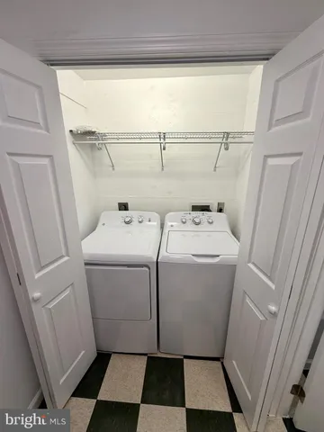 a utility room with a washer and dryer