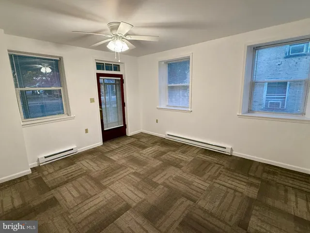 a view of an empty room with window