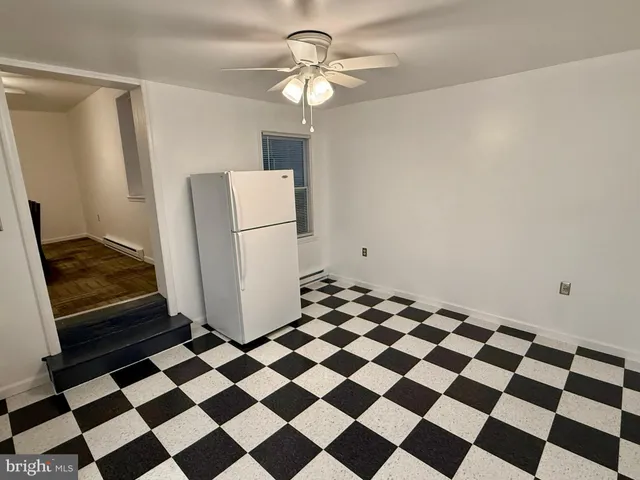 a black and white checkered floor with a black white checkered floor