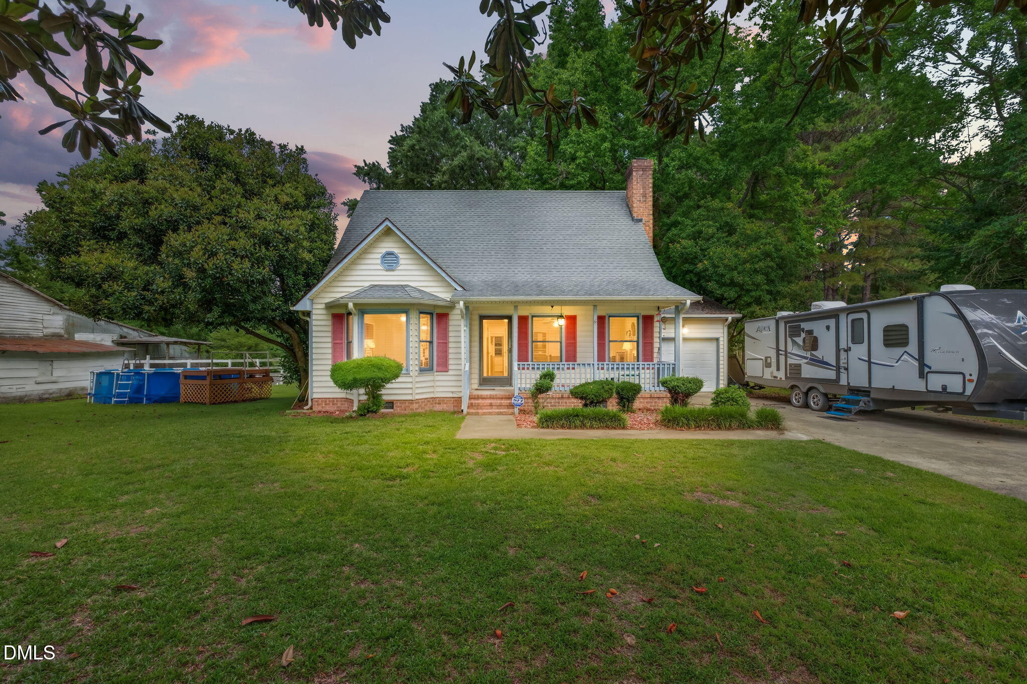350 Grantham School Road Goldsboro, NC 27530 - Photo 33 of 49 a front view of a house with a yard porch and furniture