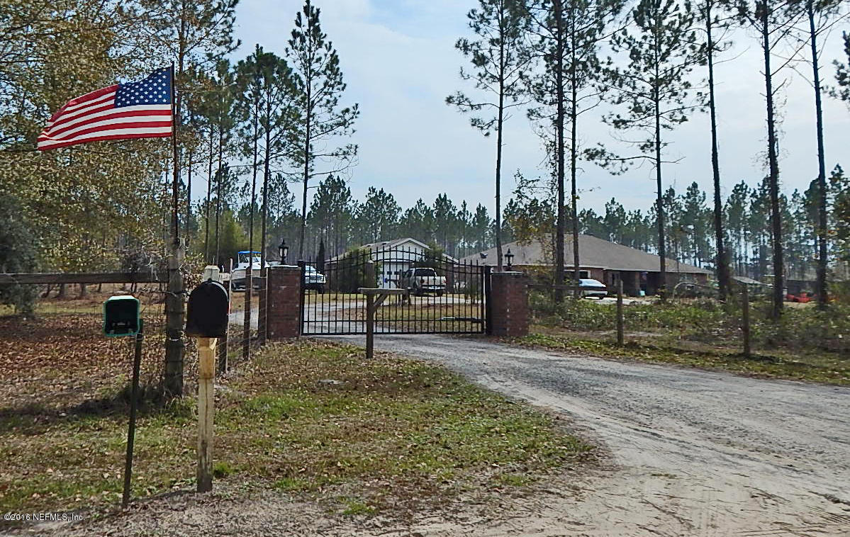 387 Higdon Road Jacksonville, FL 32234 - Photo 29 of 33 Remote Electric Front Gate