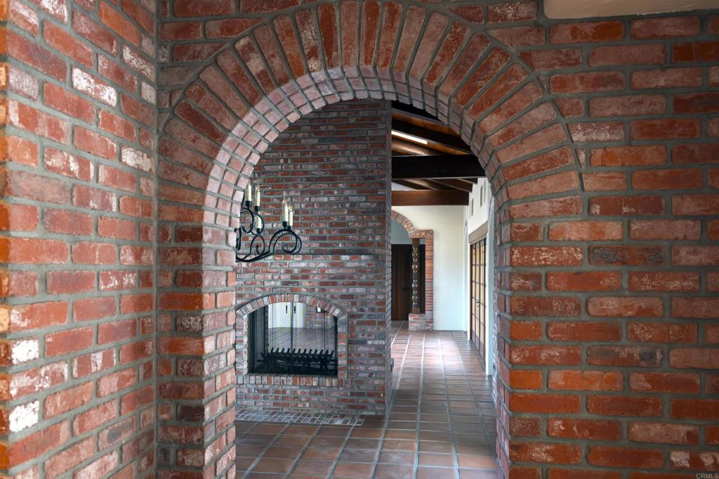 5443 Calzada Del Bosque Rancho Santa Fe, CA 92067 - Photo 17 of 56 a view of entryway with brick walls