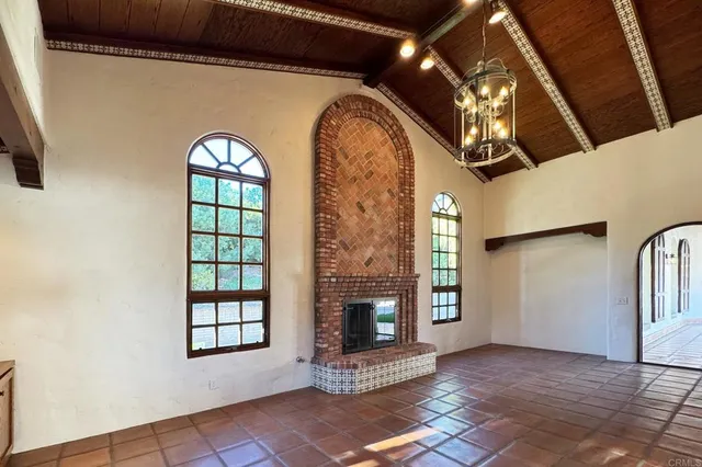 a living room with wooden floor