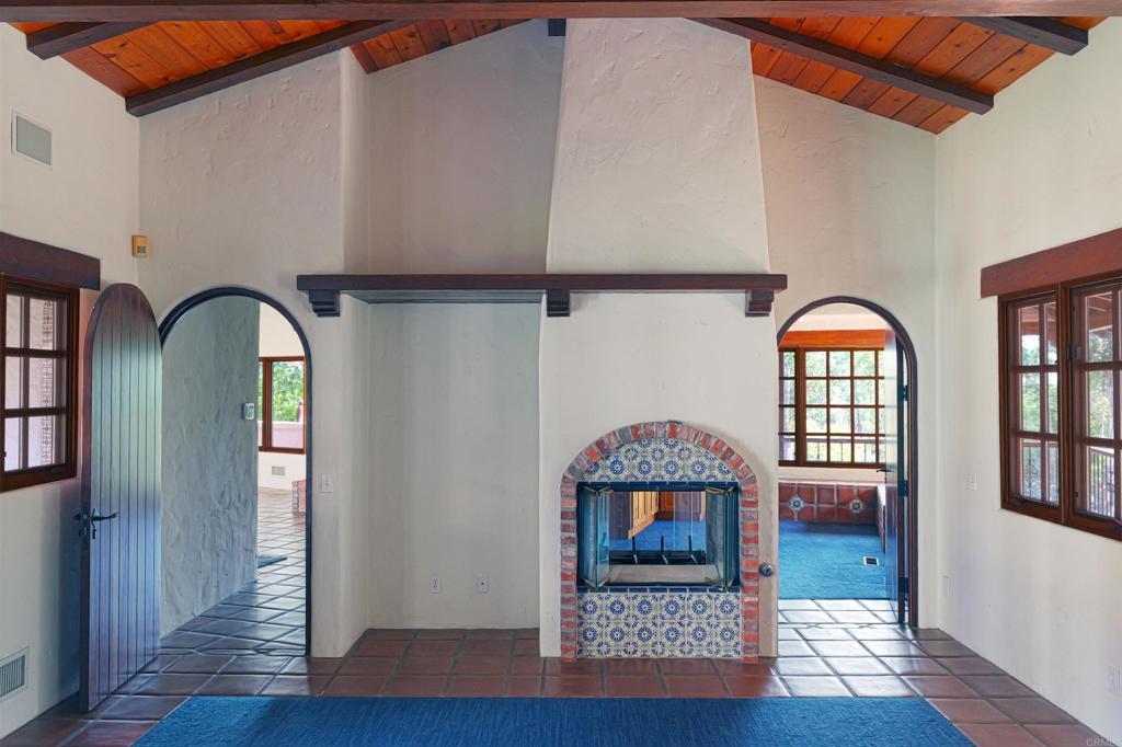 5443 Calzada Del Bosque Rancho Santa Fe, CA 92067 - Photo 30 of 56 a view of an entryway with wooden floor mirror and a window