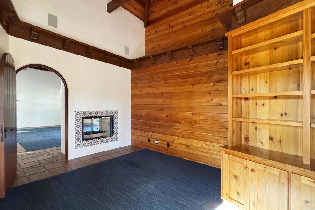 5443 Calzada Del Bosque Rancho Santa Fe, CA 92067 - Photo 30 of 63 a living room with wooden floor