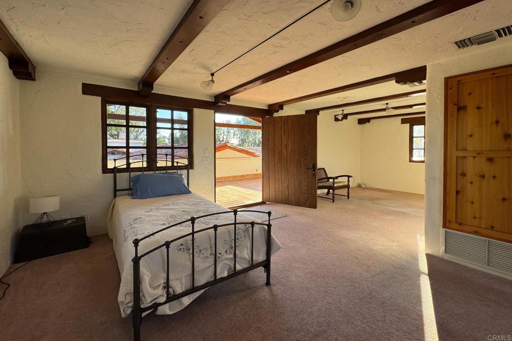 5443 Calzada Del Bosque Rancho Santa Fe, CA 92067 - Photo 50 of 63 a bedroom with furniture and a window