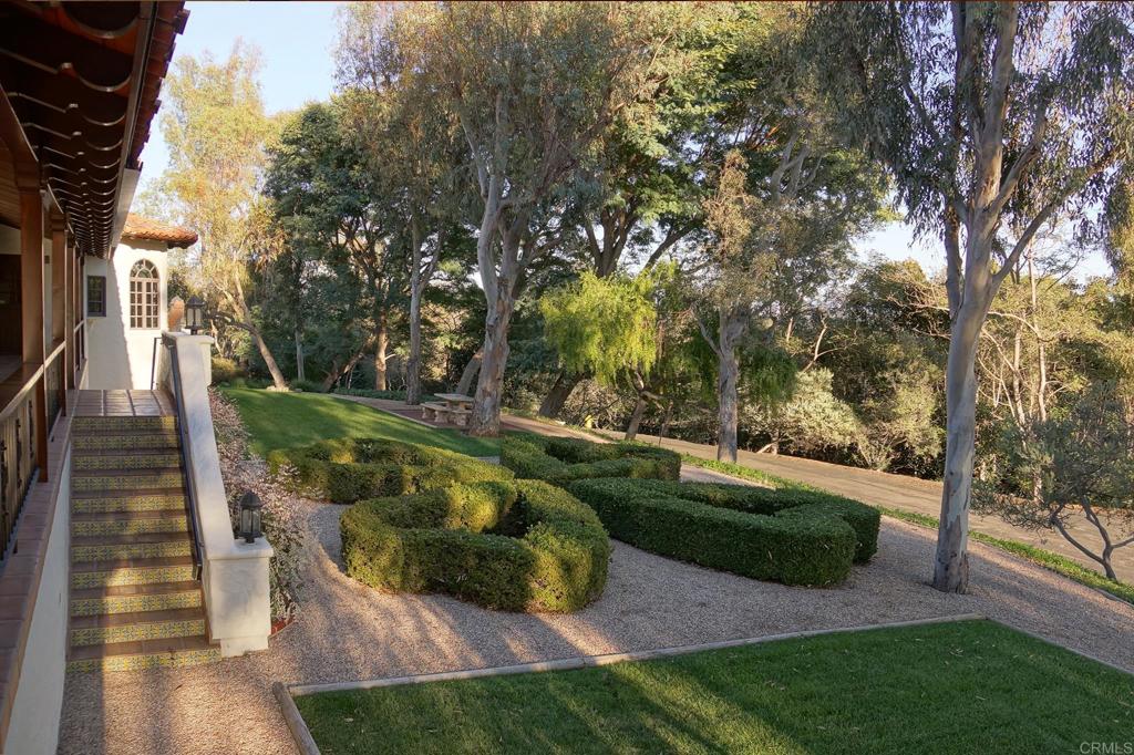 5443 Calzada Del Bosque Rancho Santa Fe, CA 92067 - Photo 57 of 63 a view of a garden with patio