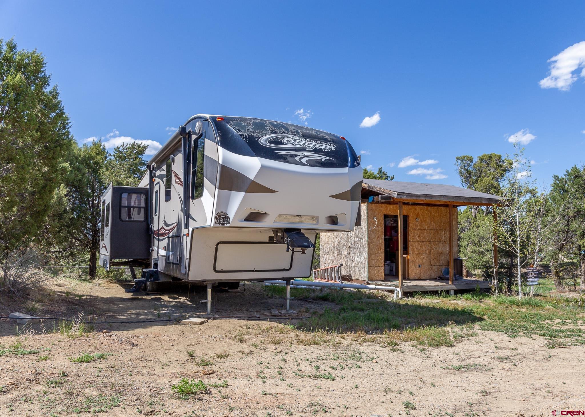 329 Payne Lane Ignacio, CO 81137 - Photo 17 of 45 a view of a house with a yard