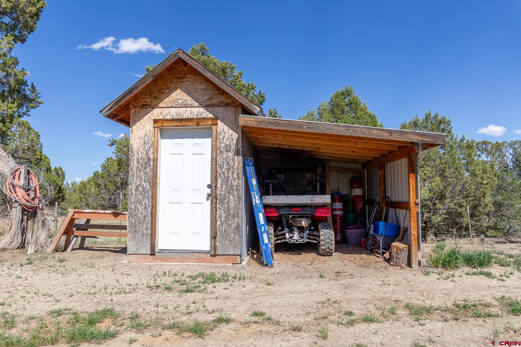 329 Payne Lane Ignacio, CO 81137 - Photo 18 of 45 a view of a car park in front of house