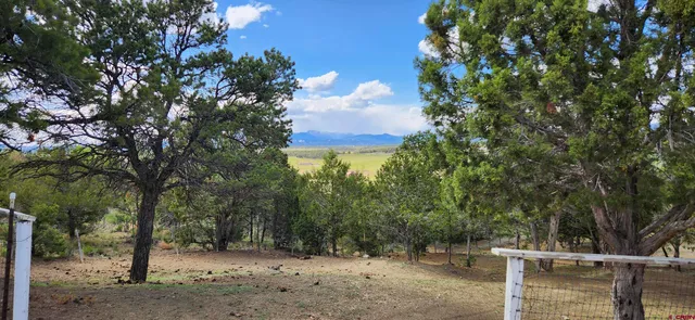 a view of a lake from a balcony