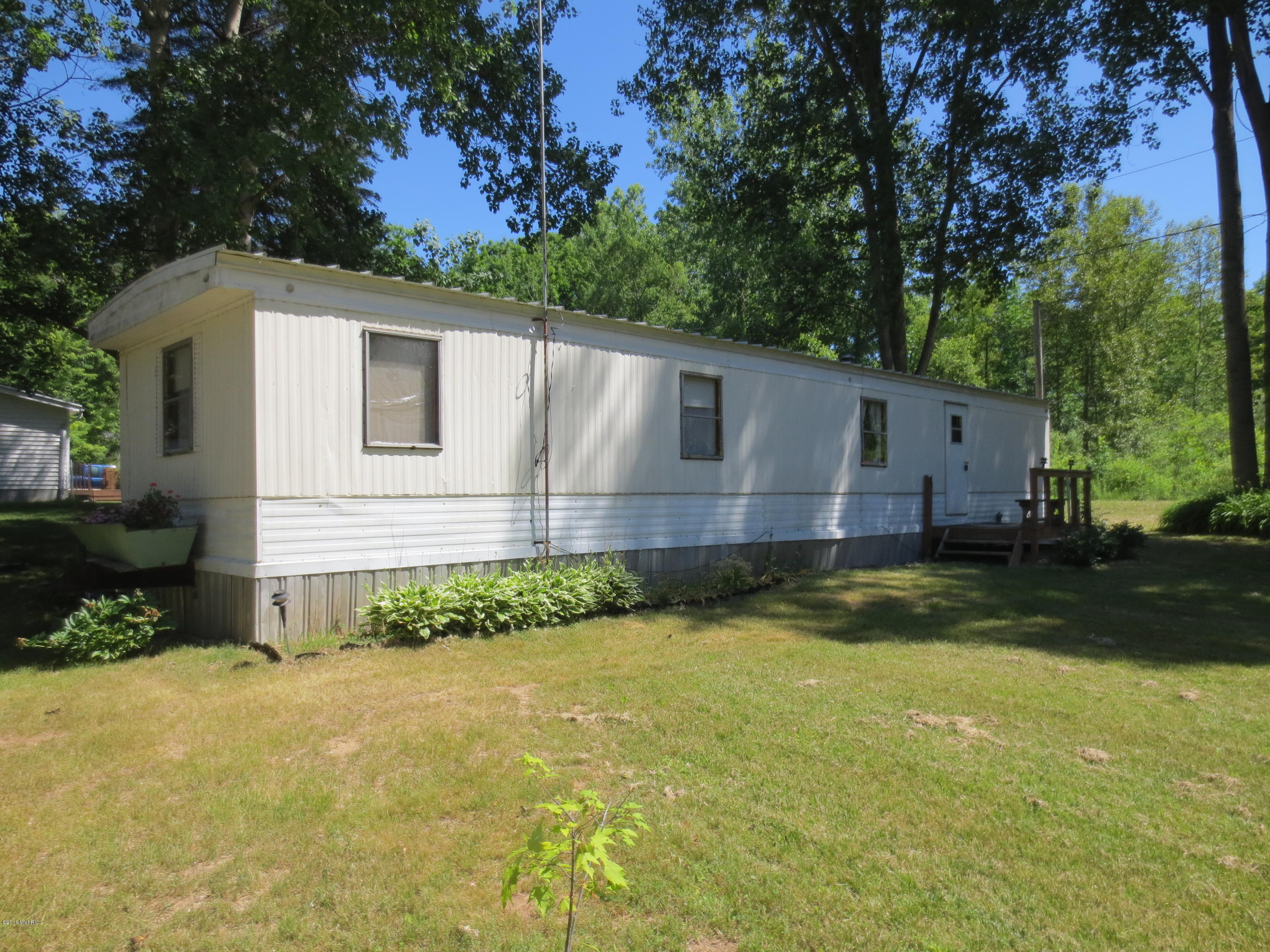 9273 16 Mile Road Rodney, MI 49342 - Photo 1 of 19 IMG_2531