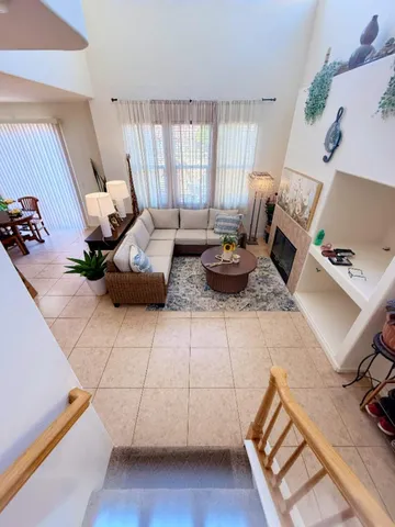 a living room with furniture and a table