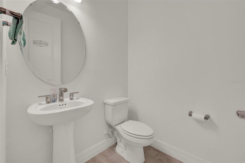 11362 Rising Sun Street Orlando, FL 32829 - Photo 14 of 35 a bathroom with a sink a toilet and shower