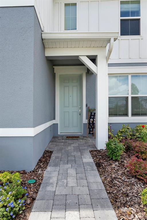 11362 Rising Sun Street Orlando, FL 32829 - Photo 4 of 35 a view of a entryway door of the house