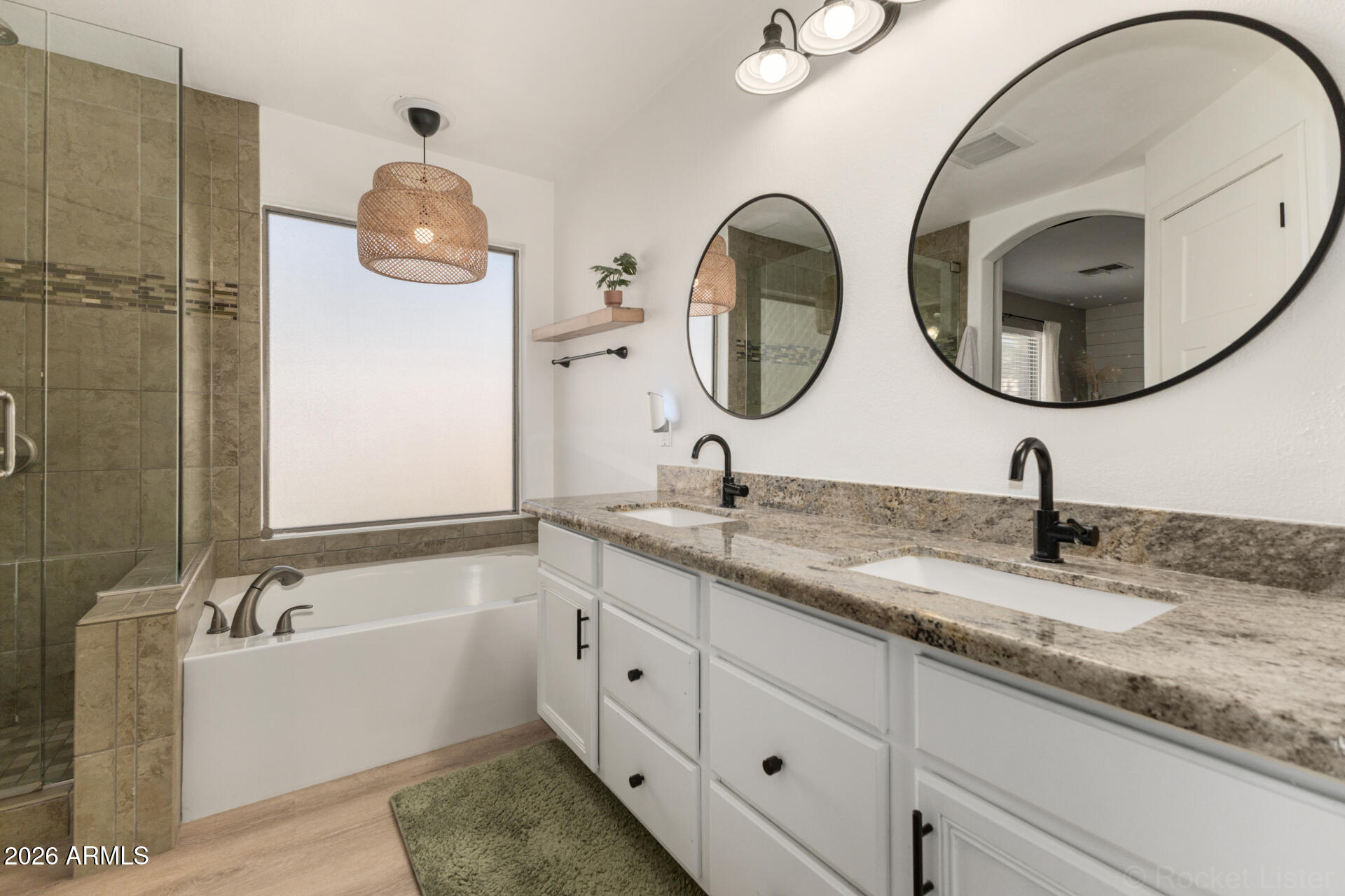1736 East Robin Lane Gilbert, AZ 85296 - Photo 13 of 25 a bathroom with a sink and a mirror