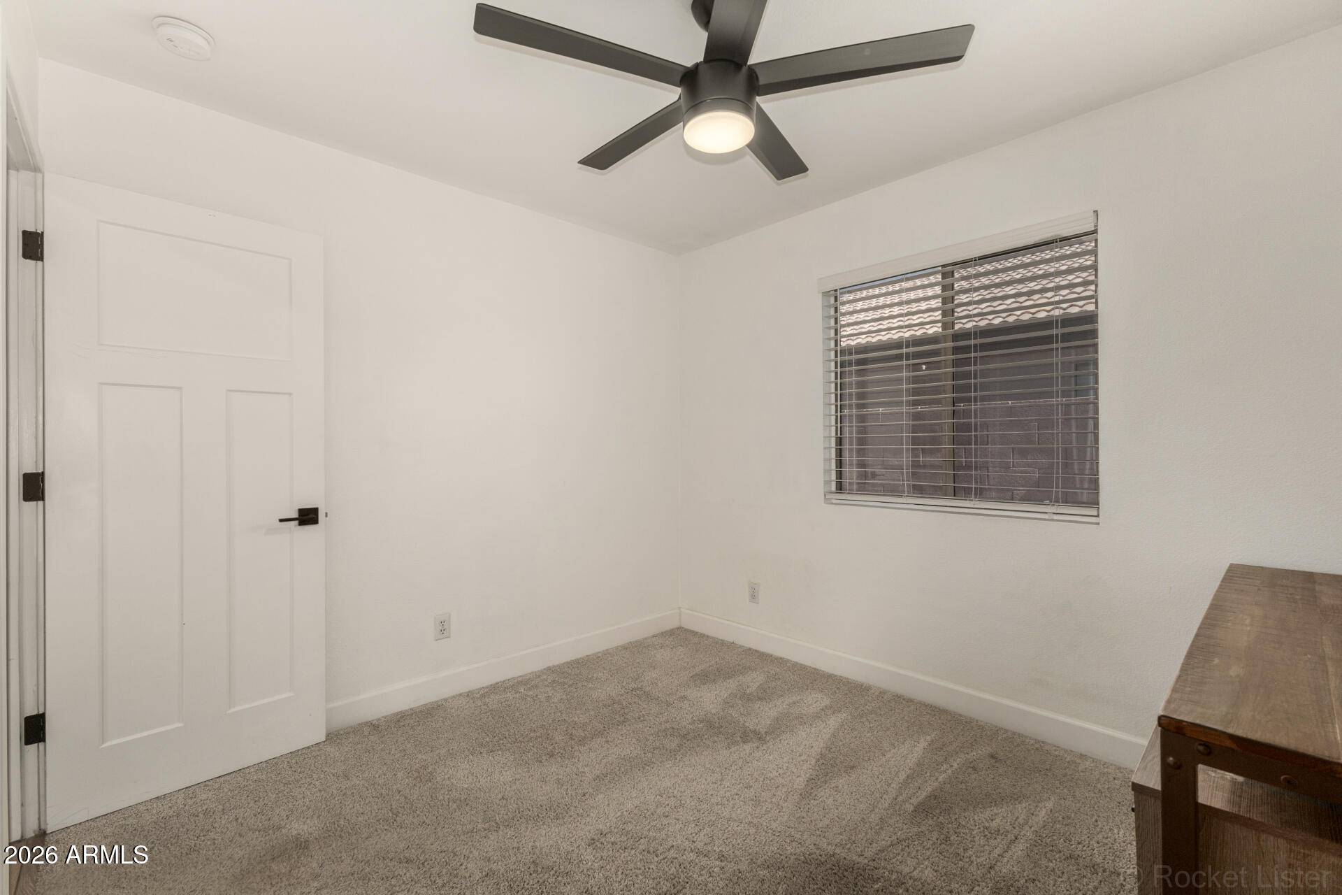 1736 East Robin Lane Gilbert, AZ 85296 - Photo 16 of 25 a view of an empty room with a window