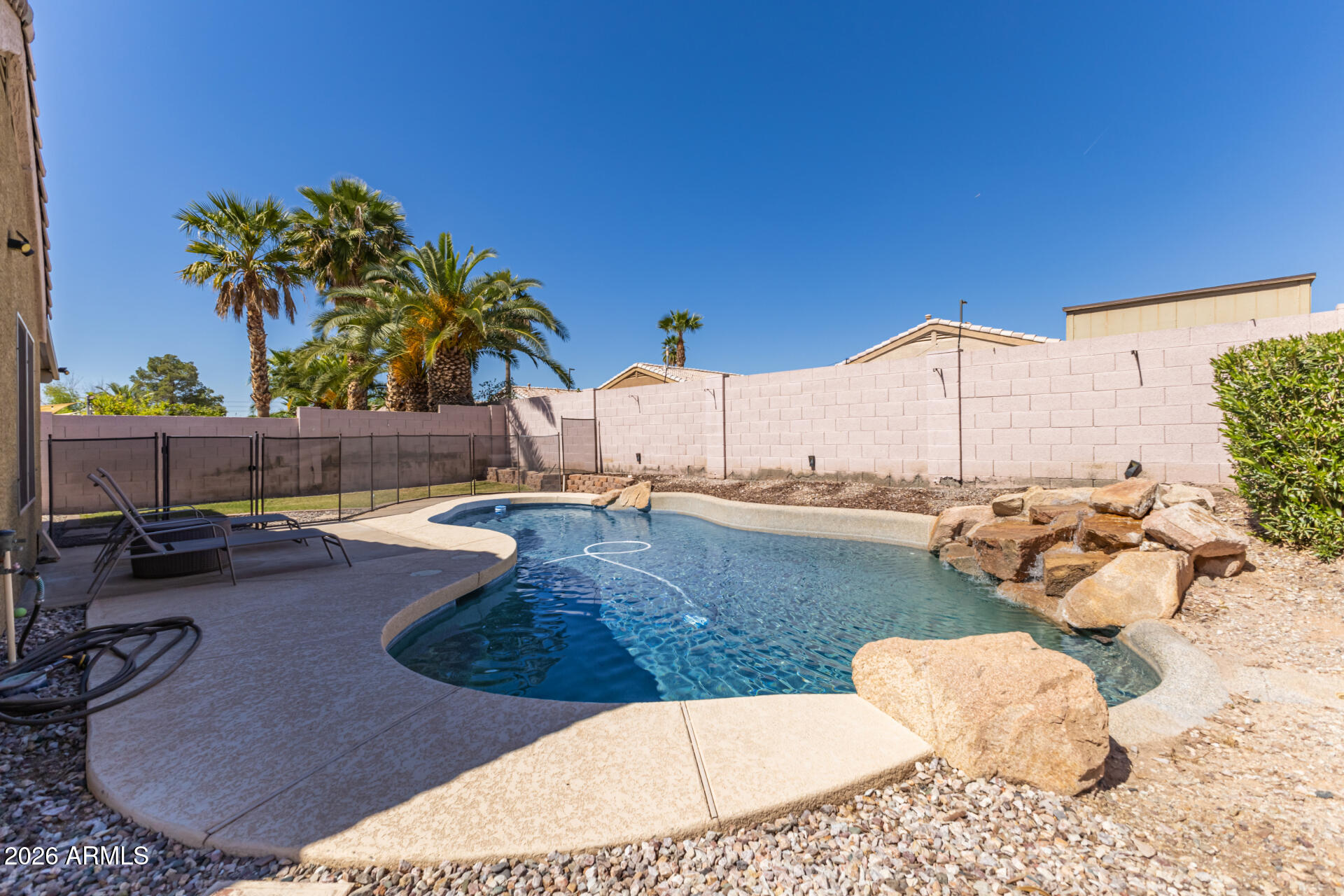 1736 East Robin Lane Gilbert, AZ 85296 - Photo 23 of 25 a view of a swimming pool and lounge chair
