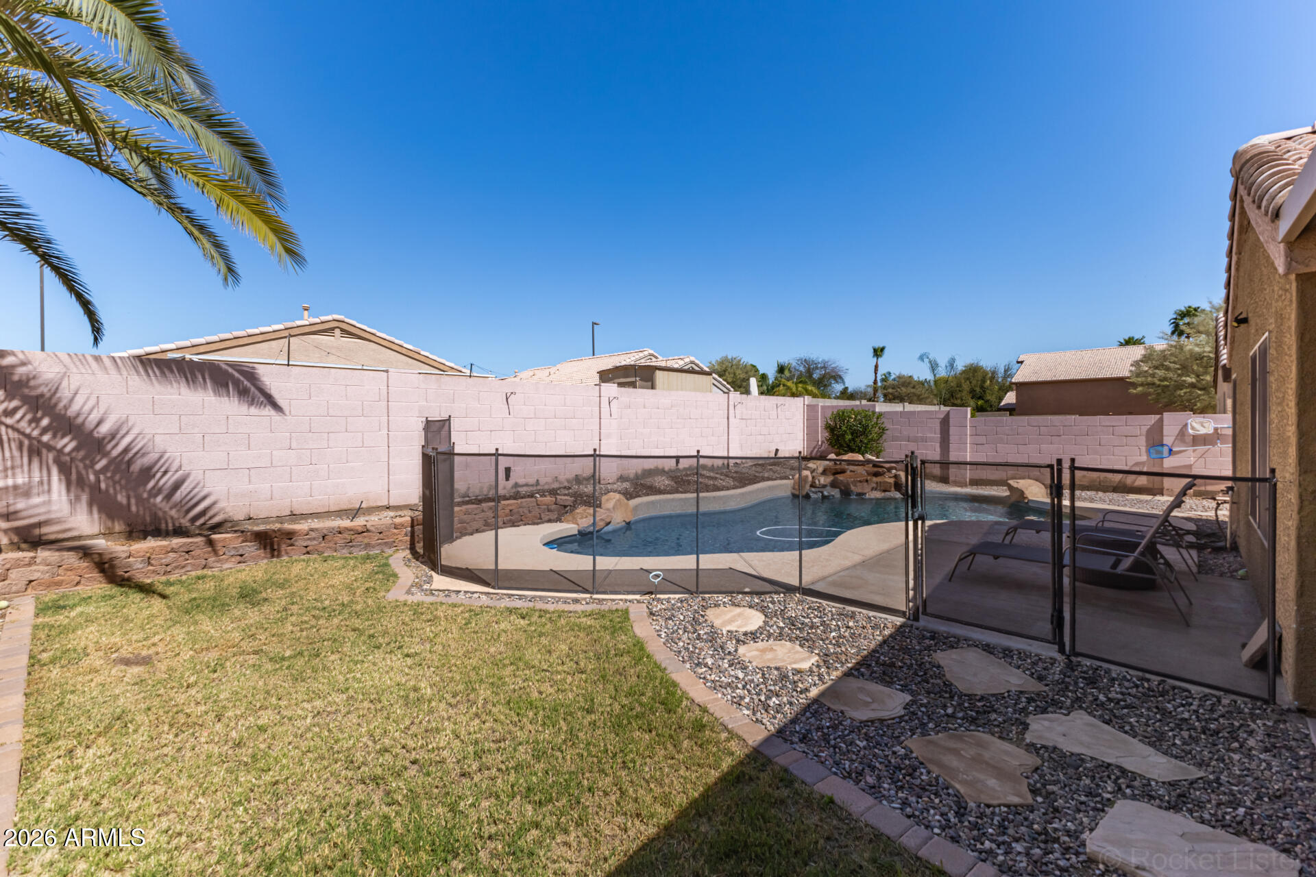 1736 East Robin Lane Gilbert, AZ 85296 - Photo 24 of 25 a view of a backyard with sitting area
