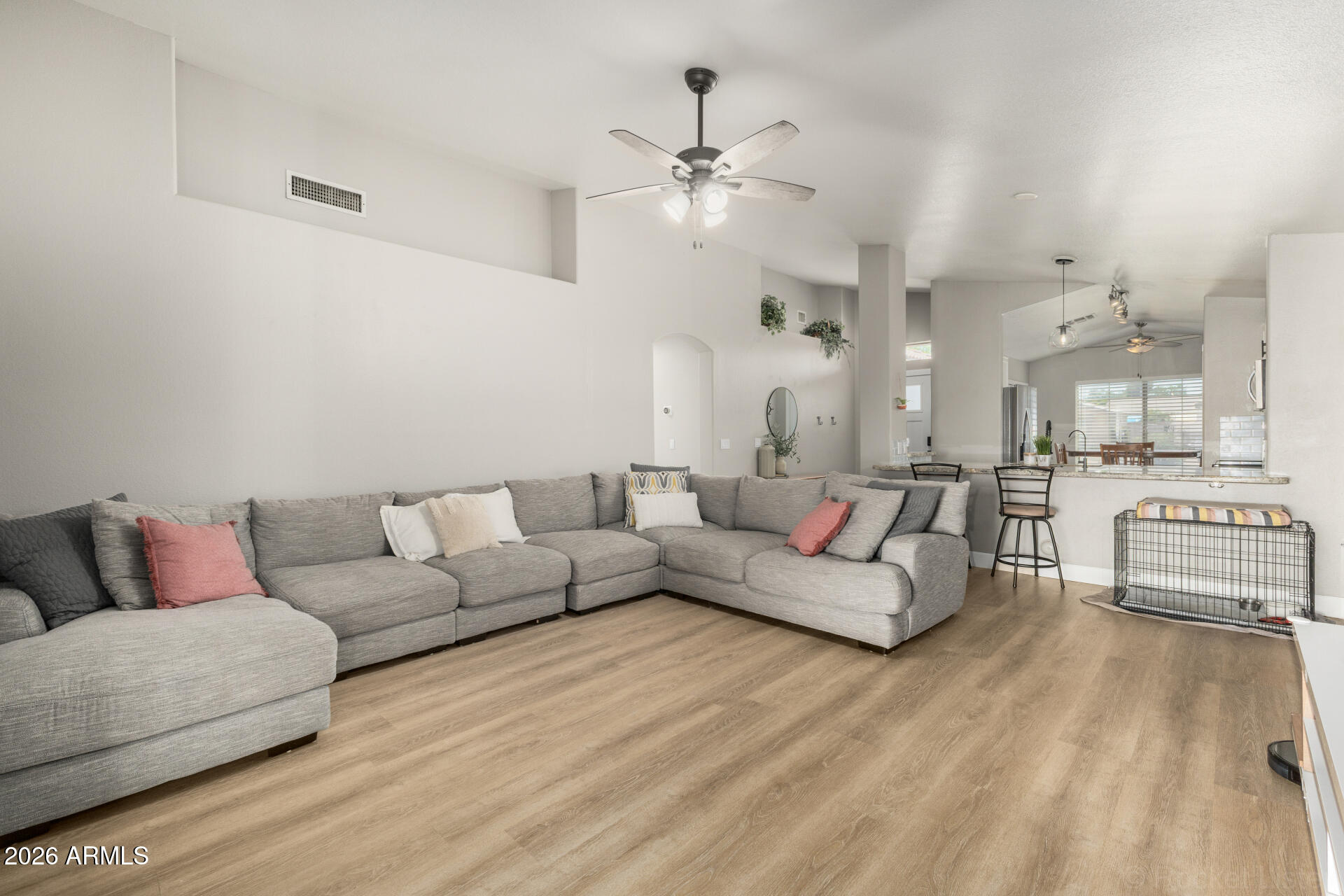 1736 East Robin Lane Gilbert, AZ 85296 - Photo 5 of 25 a living room with furniture and wooden floor