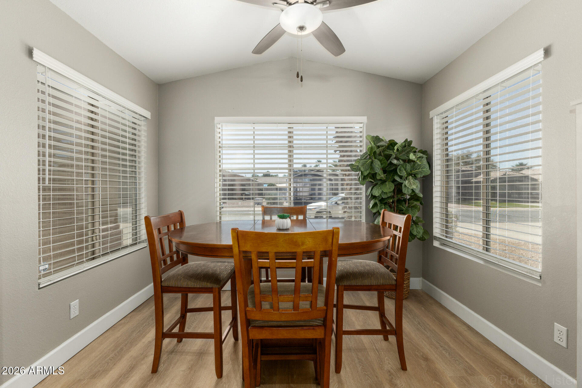1736 East Robin Lane Gilbert, AZ 85296 - Photo 9 of 25 a dining room with furniture and window