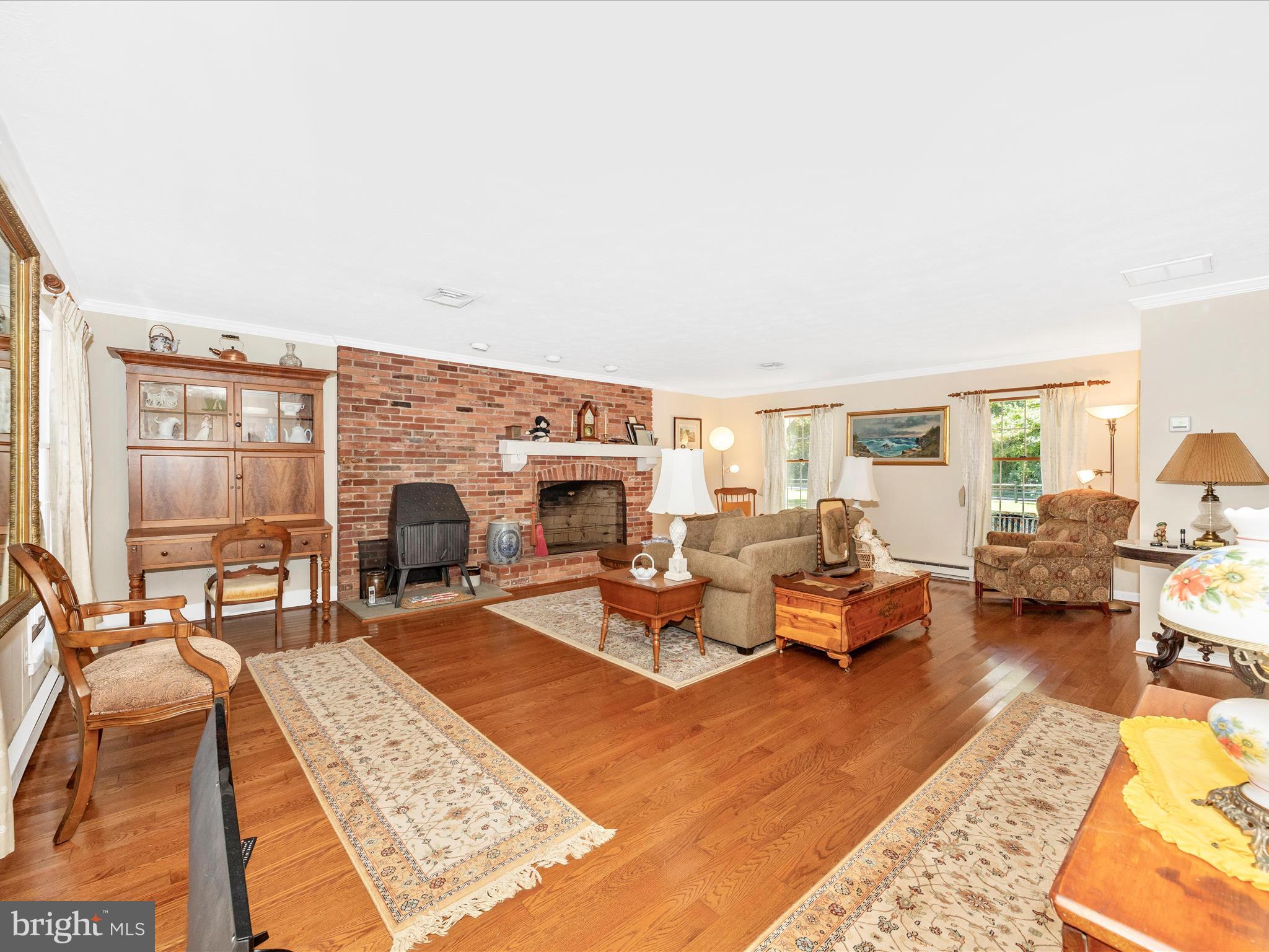 17515 Dr Bird Road Sandy Spring, MD 20860 - Photo 26 of 76 a living room with furniture large window and a table