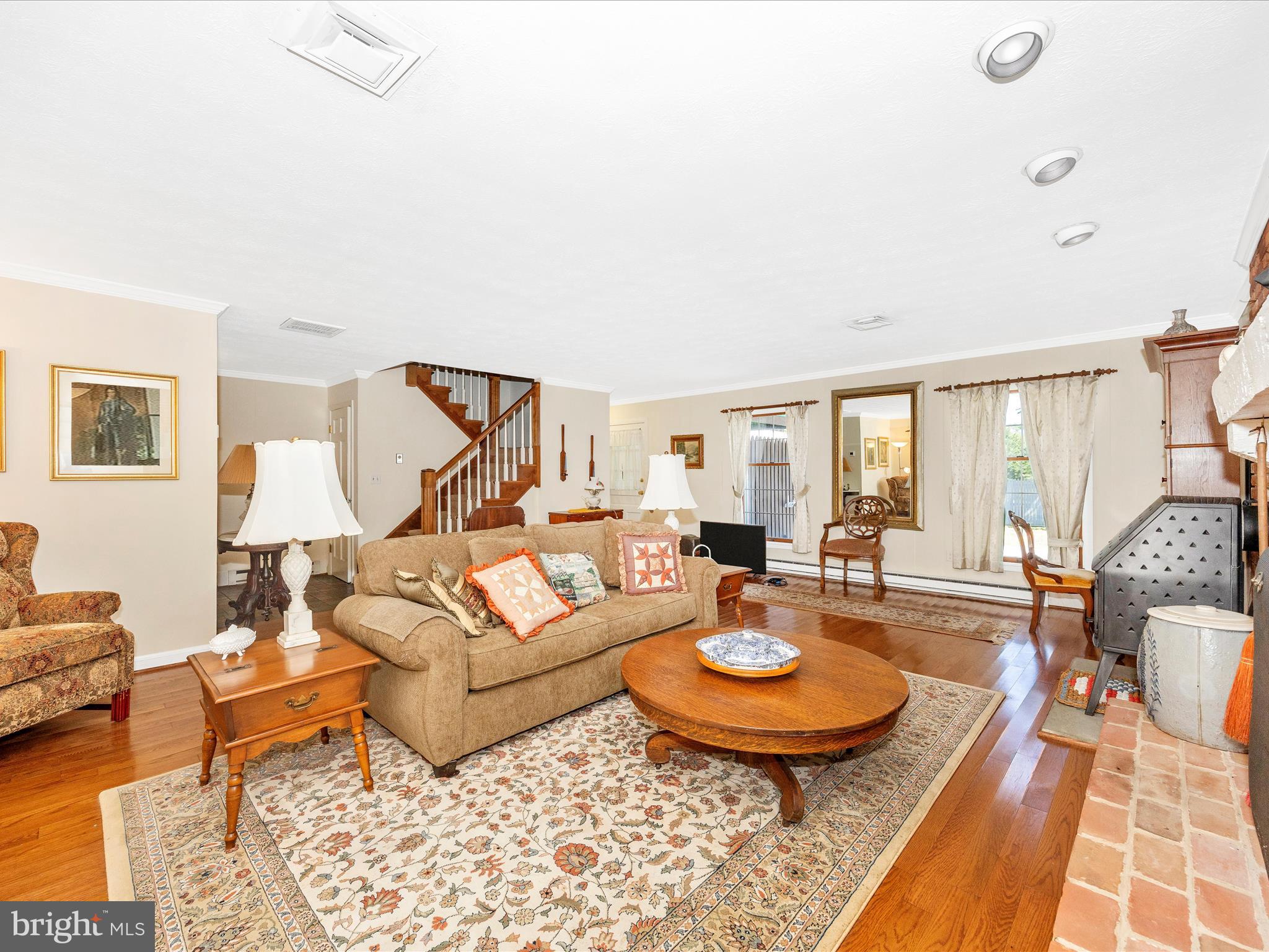 17515 Dr Bird Road Sandy Spring, MD 20860 - Photo 27 of 76 a living room with furniture and wooden floor