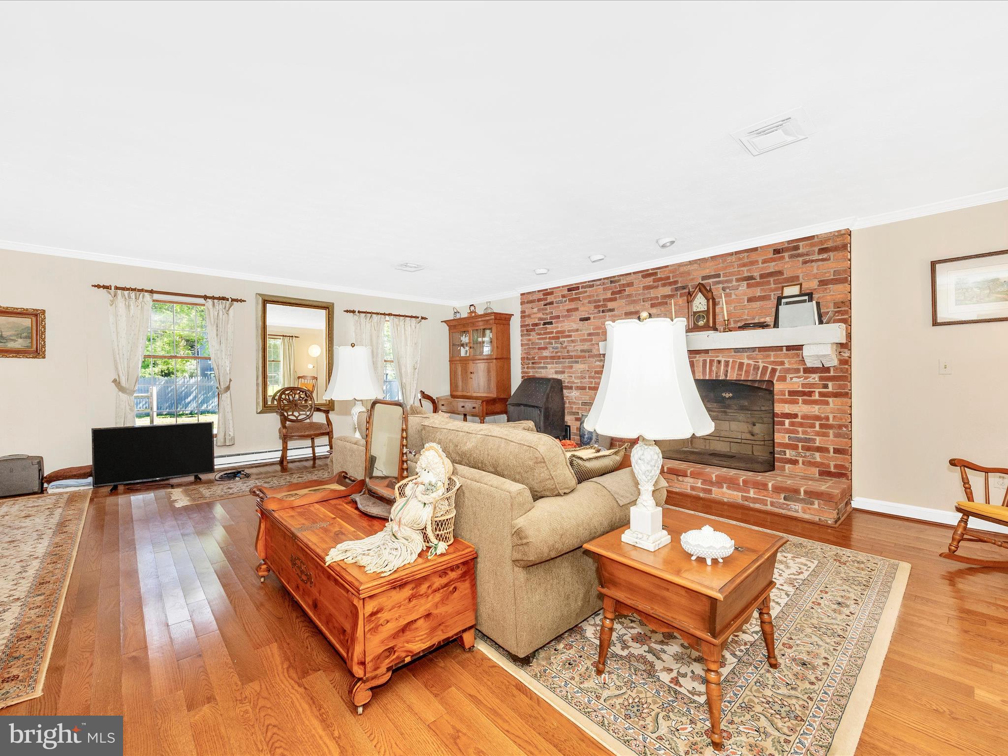 17515 Dr Bird Road Sandy Spring, MD 20860 - Photo 28 of 76 a living room with furniture and wooden floor