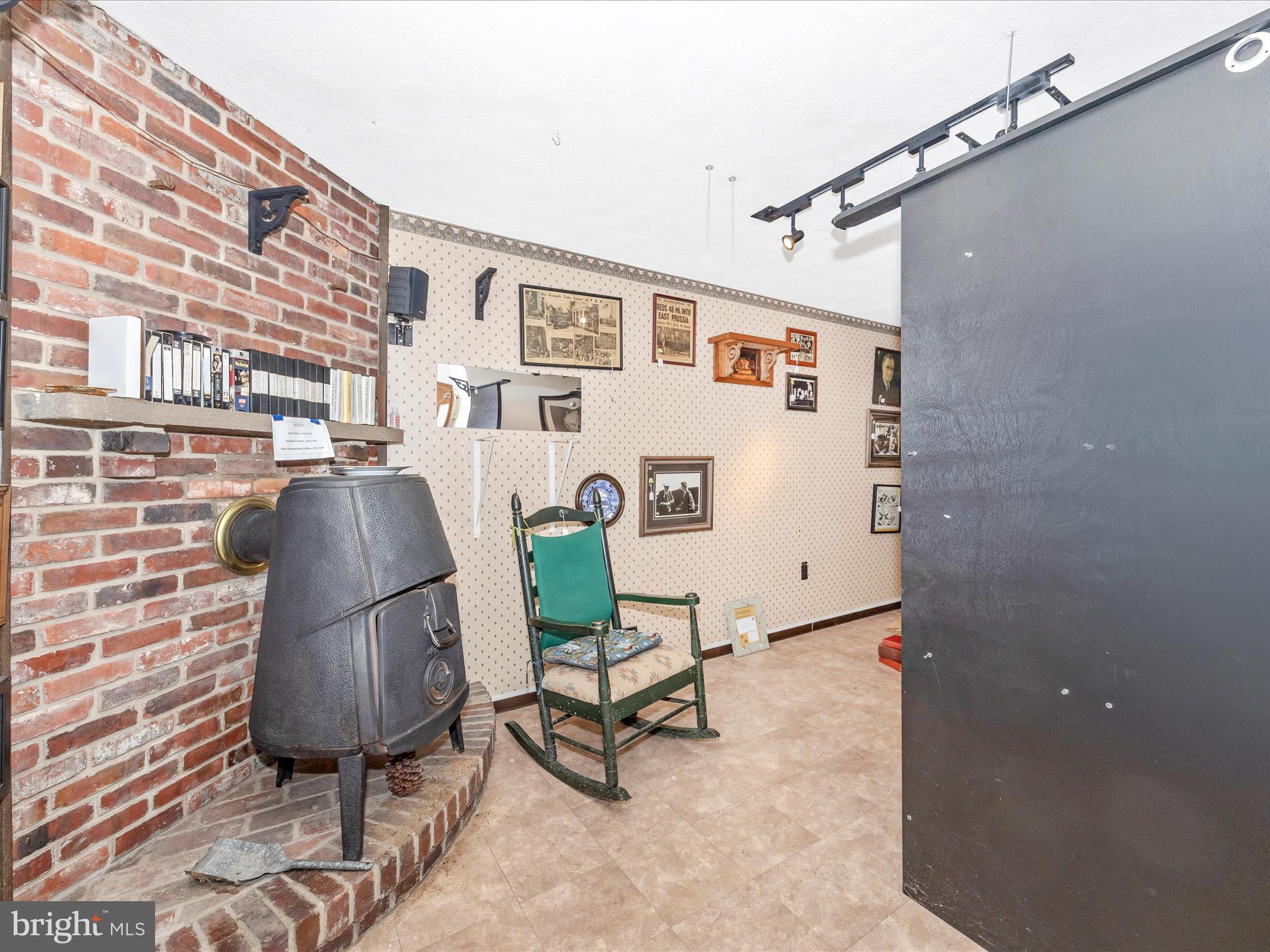 17515 Dr Bird Road Sandy Spring, MD 20860 - Photo 47 of 76 a living room with furniture and a rug
