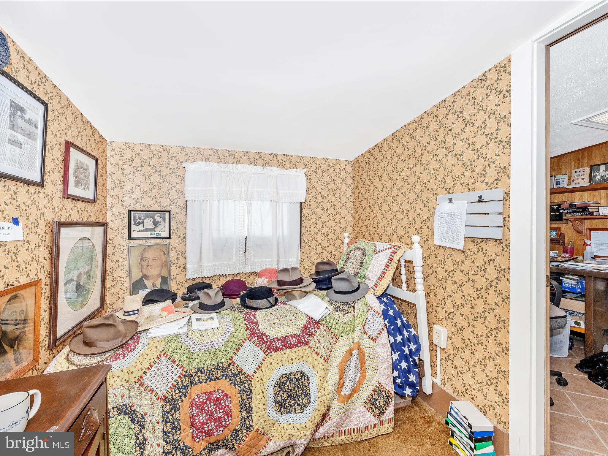 17515 Dr Bird Road Sandy Spring, MD 20860 - Photo 49 of 76 a bed room with a bed and a couch