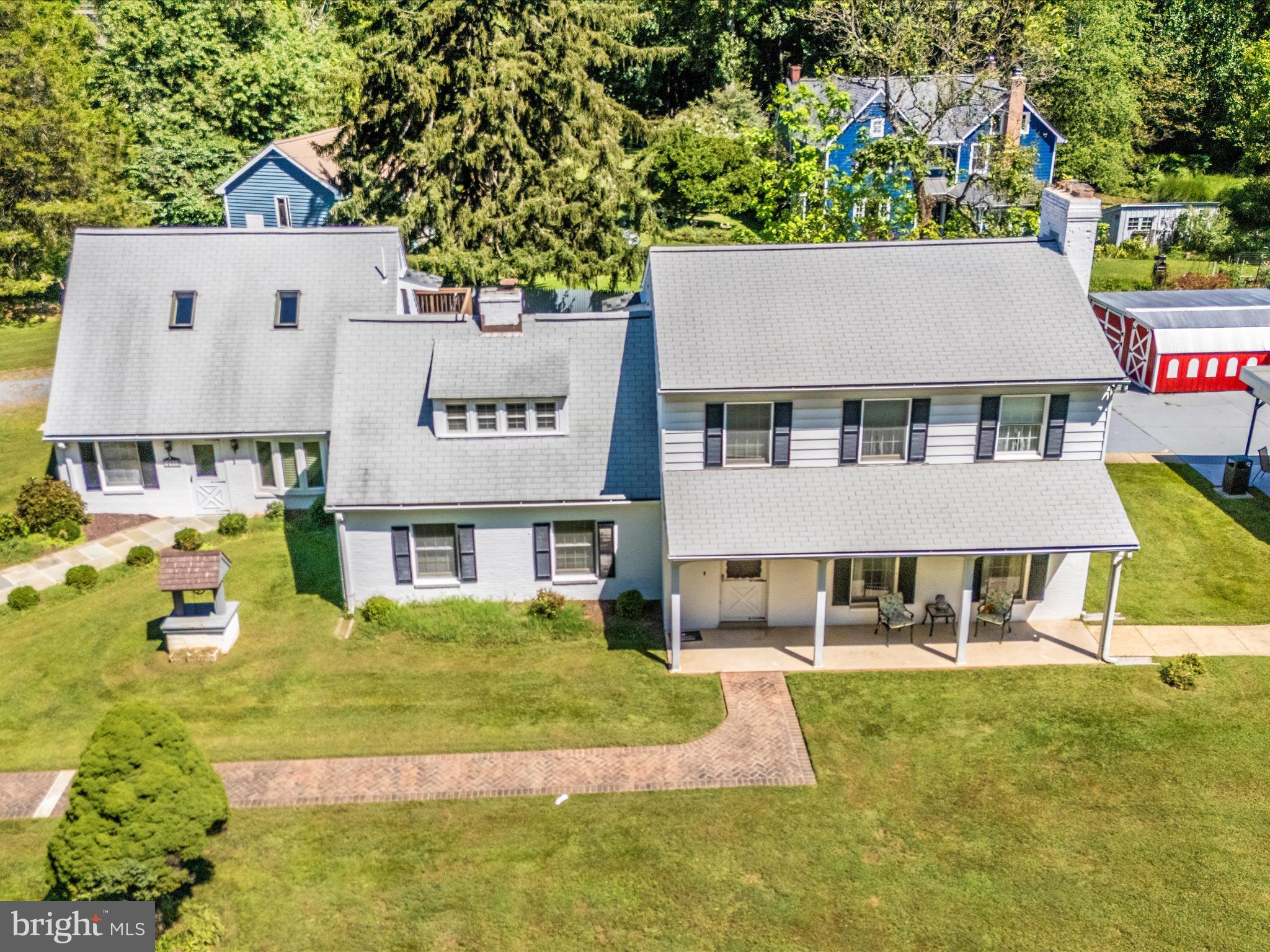 17515 Dr Bird Road Sandy Spring, MD 20860 - Photo 70 of 76 a view of a house with a swimming pool