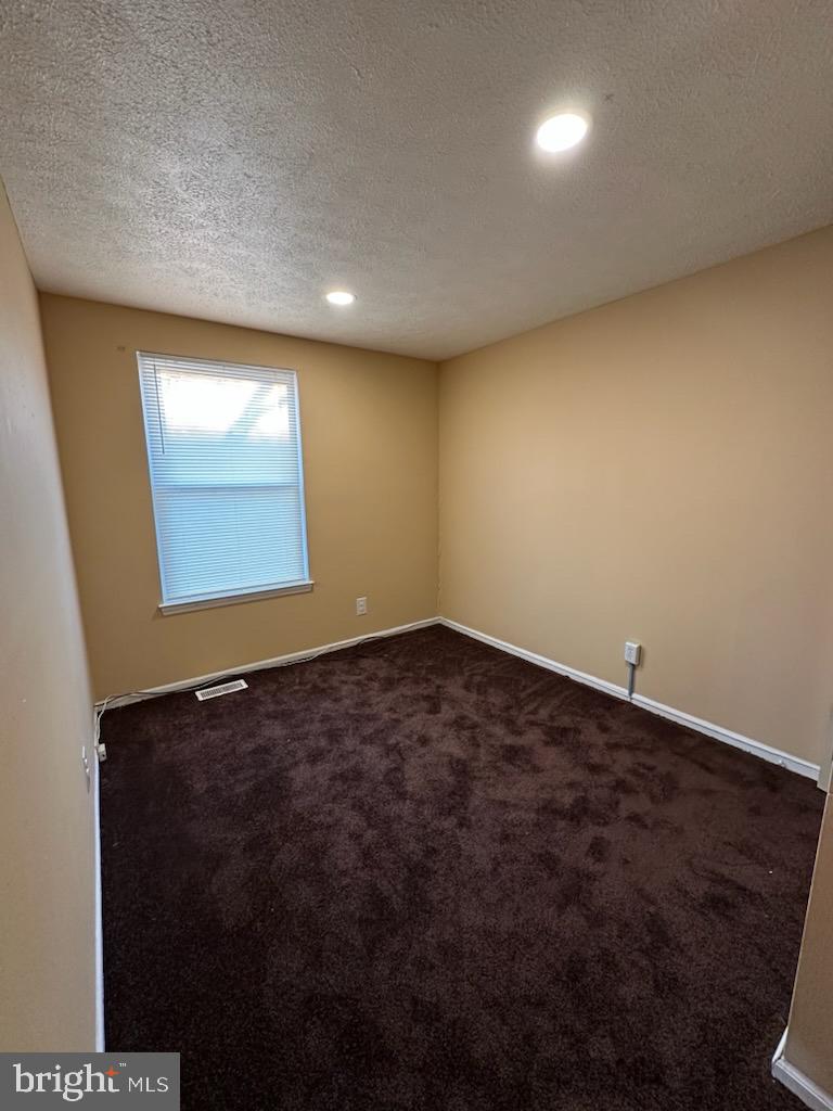 70 Vanderbilt Court Sicklerville, NJ 08081 - Photo 13 of 14 an empty room with a window