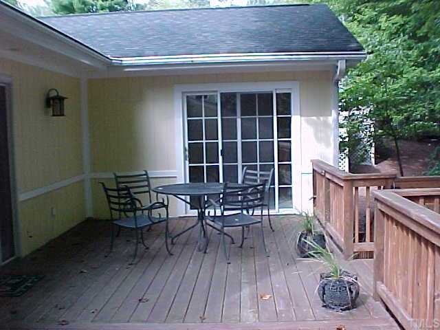 2809 Rue Sans Famille Raleigh, NC 27607 - Photo 3 of 3 a view of a house with backyard and sitting area
