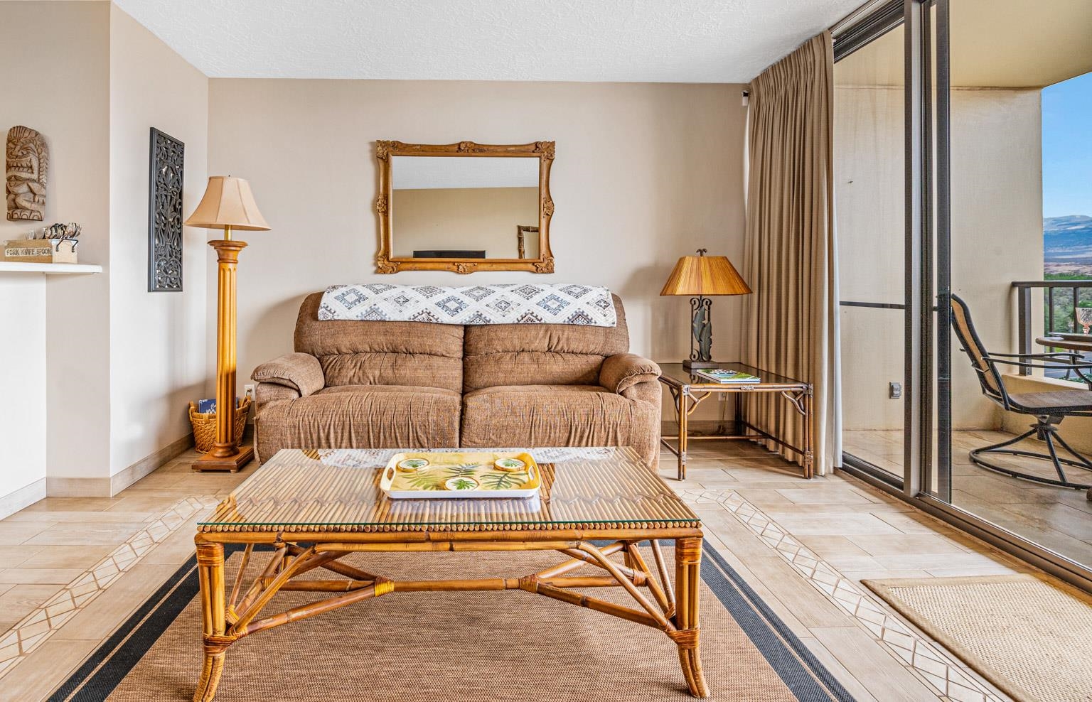 145 North Kihei Road, Unit PH5 Kihei, HI 96753 - Photo 11 of 26 a living room with a stove and a table chair