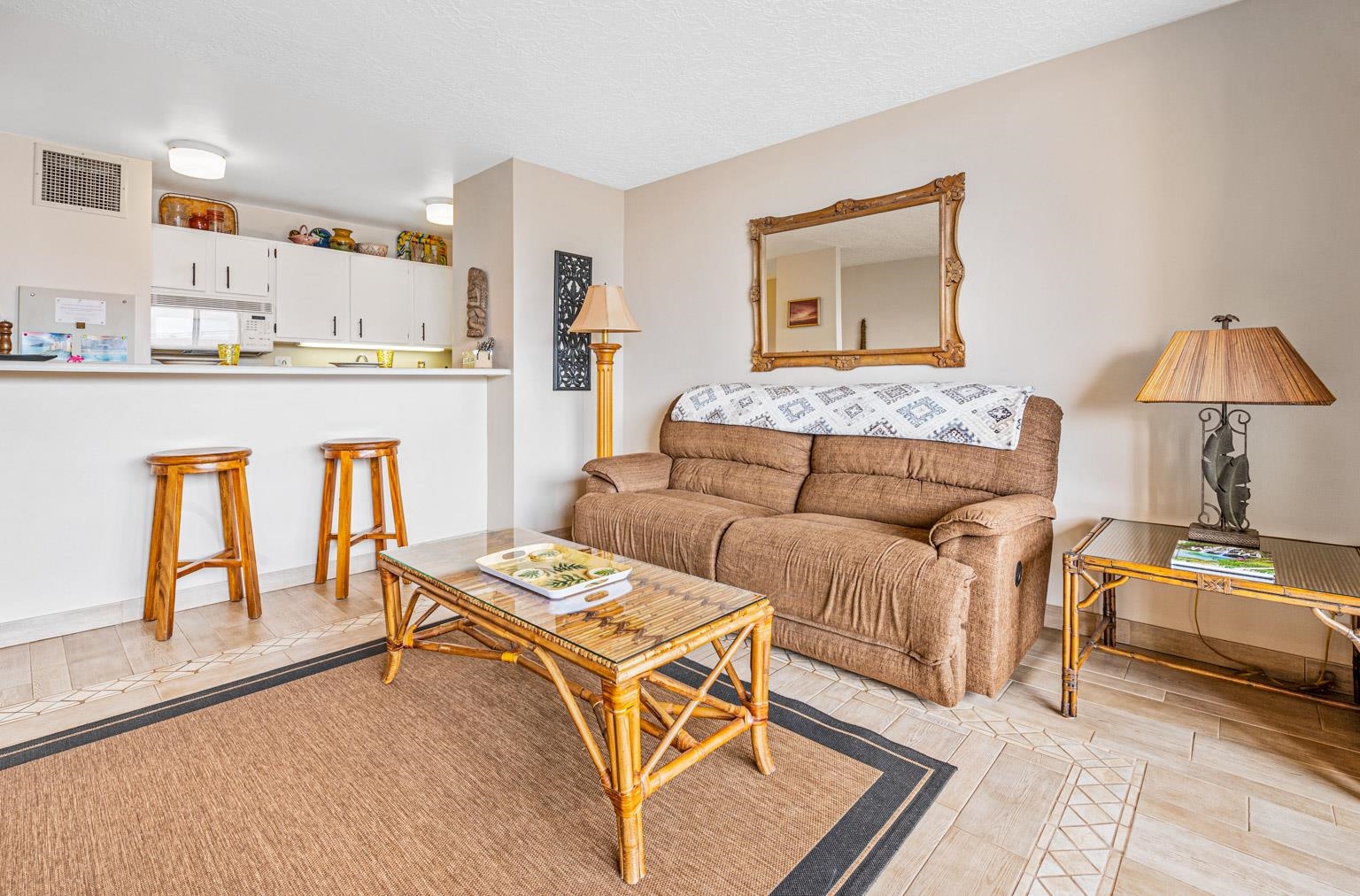 145 North Kihei Road, Unit PH5 Kihei, HI 96753 - Photo 12 of 26 a living room with furniture and a table