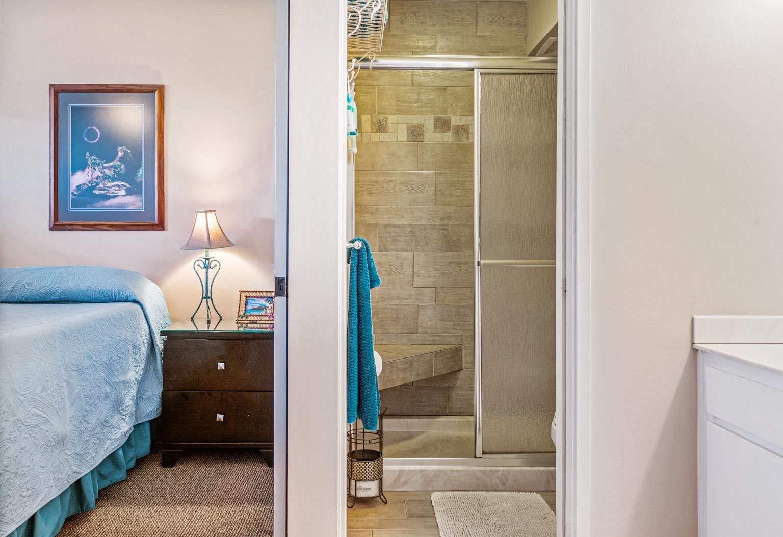 145 North Kihei Road, Unit PH5 Kihei, HI 96753 - Photo 20 of 26 a bathroom with a granite countertop shower a sink and toilet