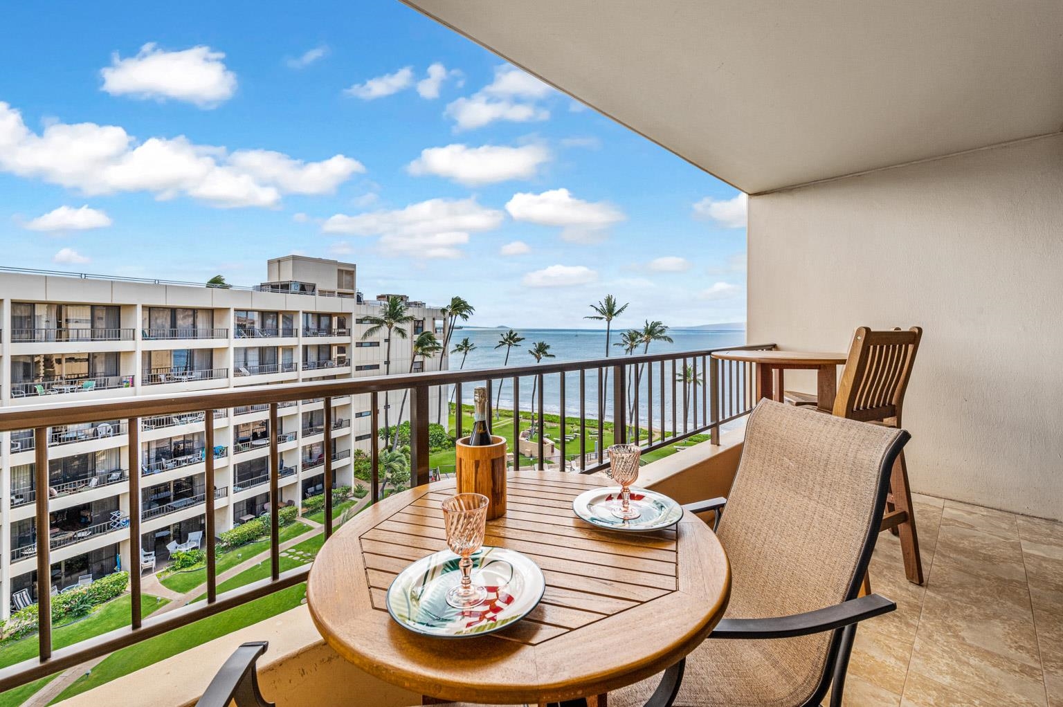 145 North Kihei Road, Unit PH5 Kihei, HI 96753 - Photo 3 of 26 a view of a chair and table on the deck