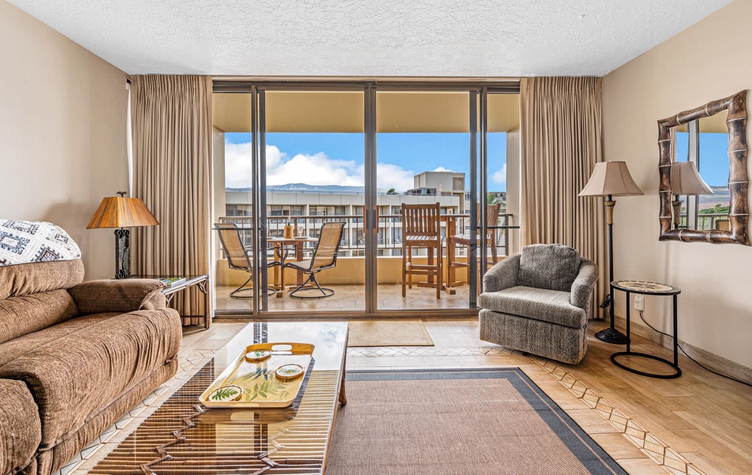145 North Kihei Road, Unit PH5 Kihei, HI 96753 - Photo 7 of 26 a living room with furniture and a large window