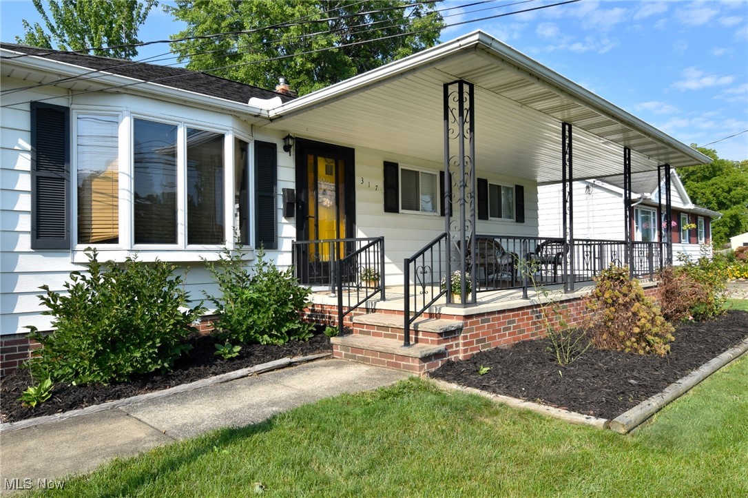 View of front of home with a porch
