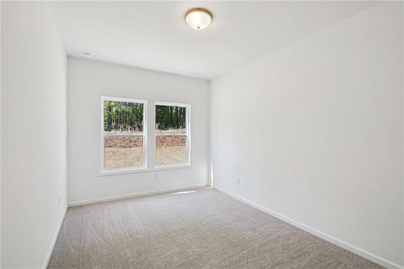 240 Silverleaf Trail Bethlehem, GA 30620 - Photo 17 of 35 an empty room with a window