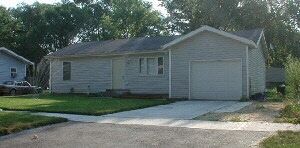 7601 Randy Road Machesney Park, IL 61115 - Photo 1 of 1 a front view of a house with a yard