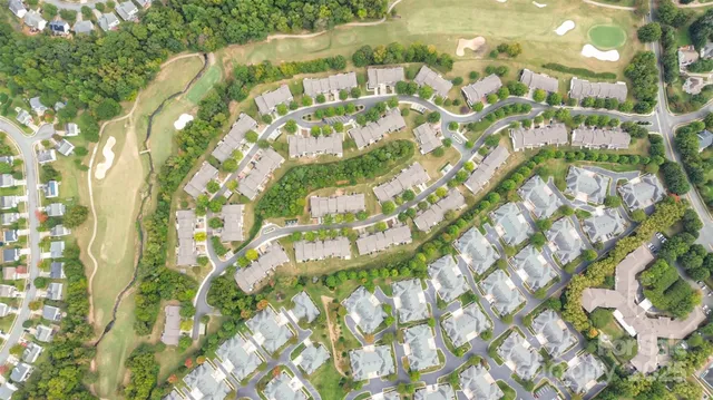 a view of house with large windows