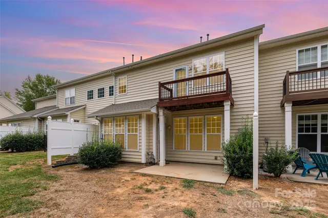 a view of a patio with swimming pool