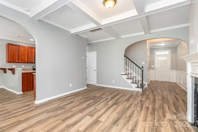 a view of entryway with wooden floor