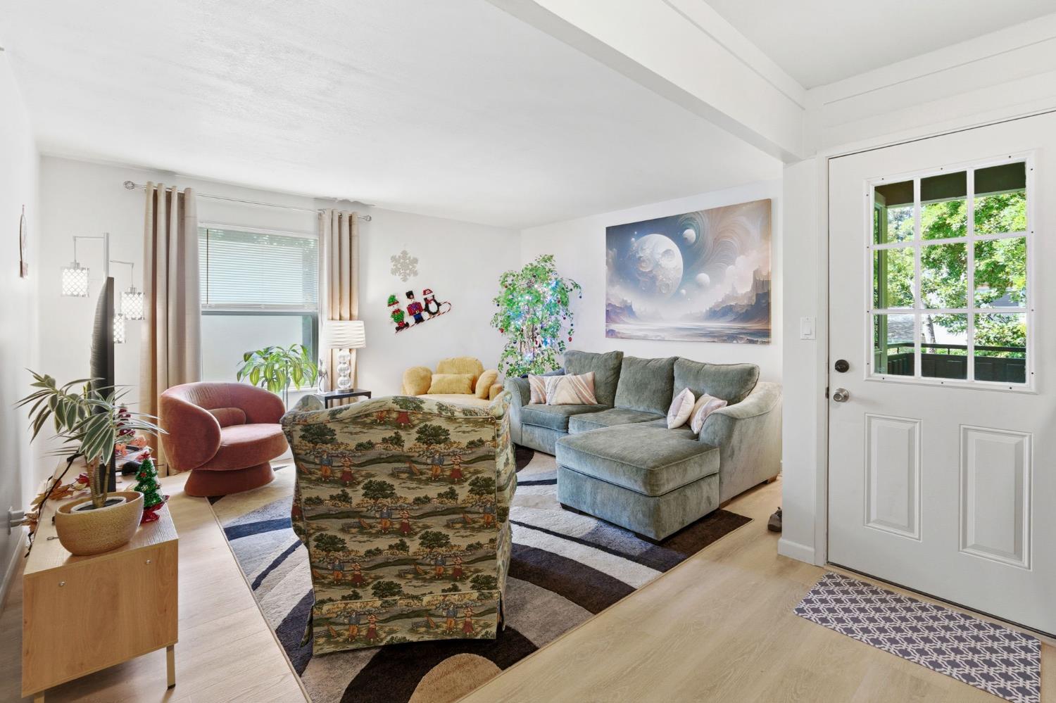 240 2nd Street Davis, CA 95616 - Photo 17 of 56 a living room with furniture or couch and a window