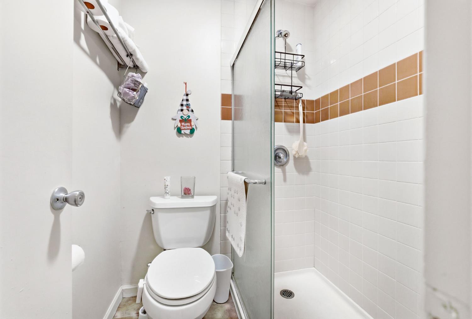 240 2nd Street Davis, CA 95616 - Photo 27 of 56 a white toilet sitting next to a bathroom sink