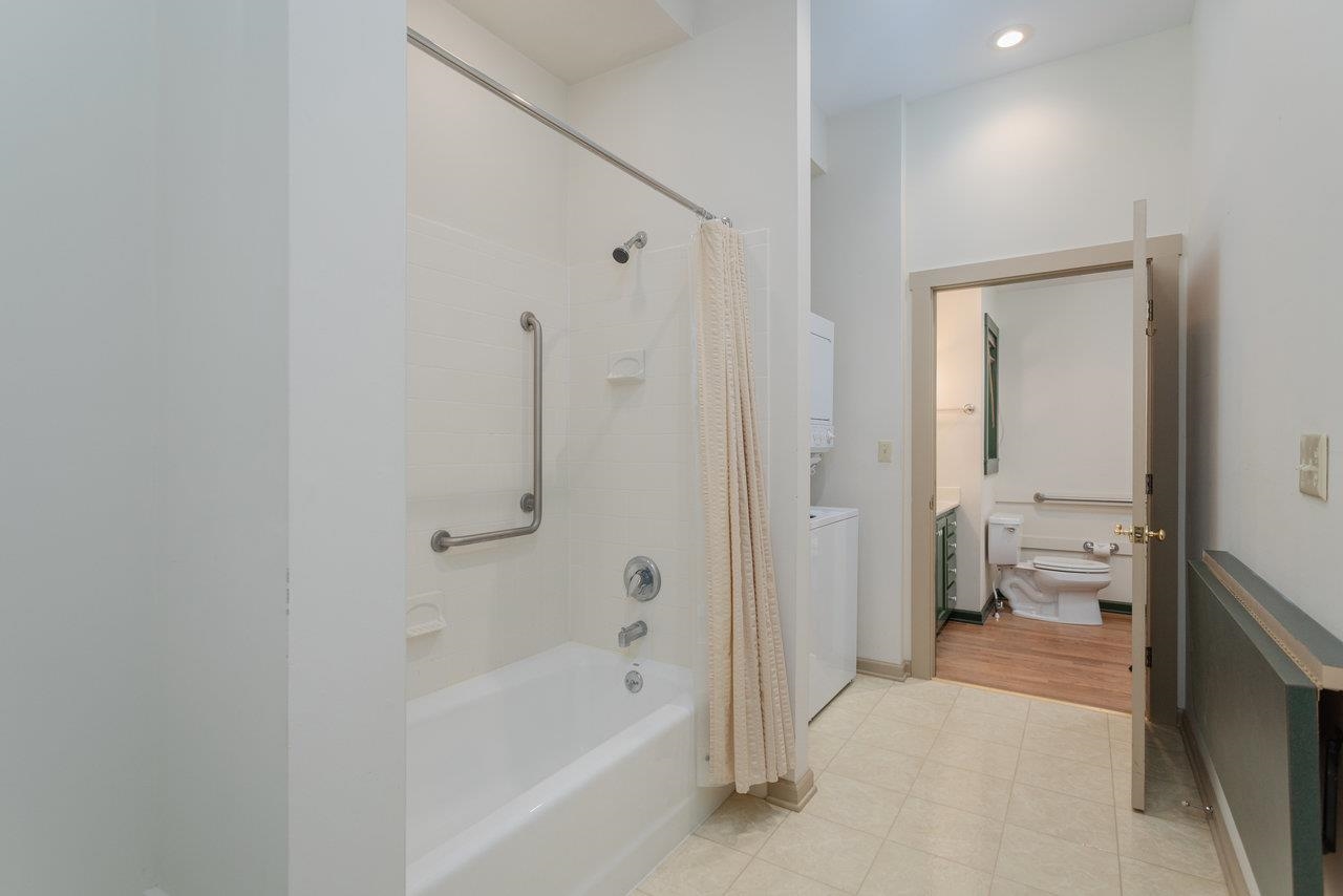 145 Fort Defiance Road Fort Defiance, VA 24437 - Photo 13 of 70 a bathroom with a bathtub and a shower
