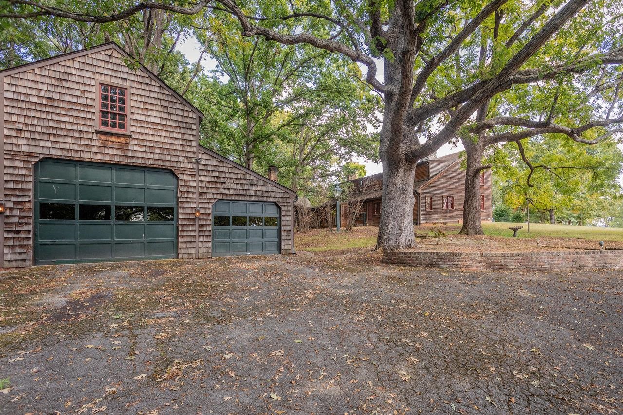145 Fort Defiance Road Fort Defiance, VA 24437 - Photo 60 of 70 a front view of a house with a yard and garage