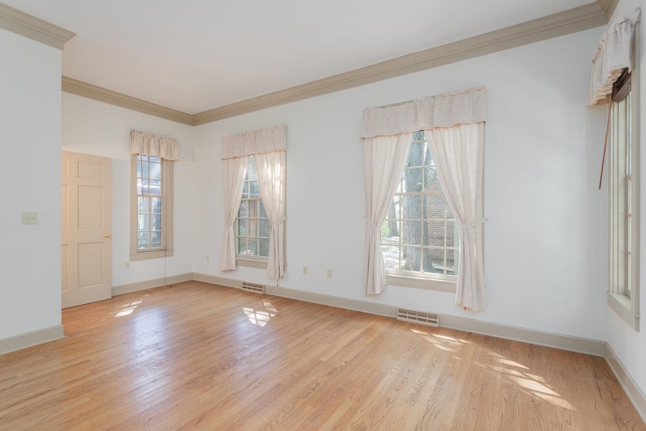 145 Fort Defiance Road Fort Defiance, VA 24437 - Photo 8 of 70 a view of an empty room with wooden floor and a window